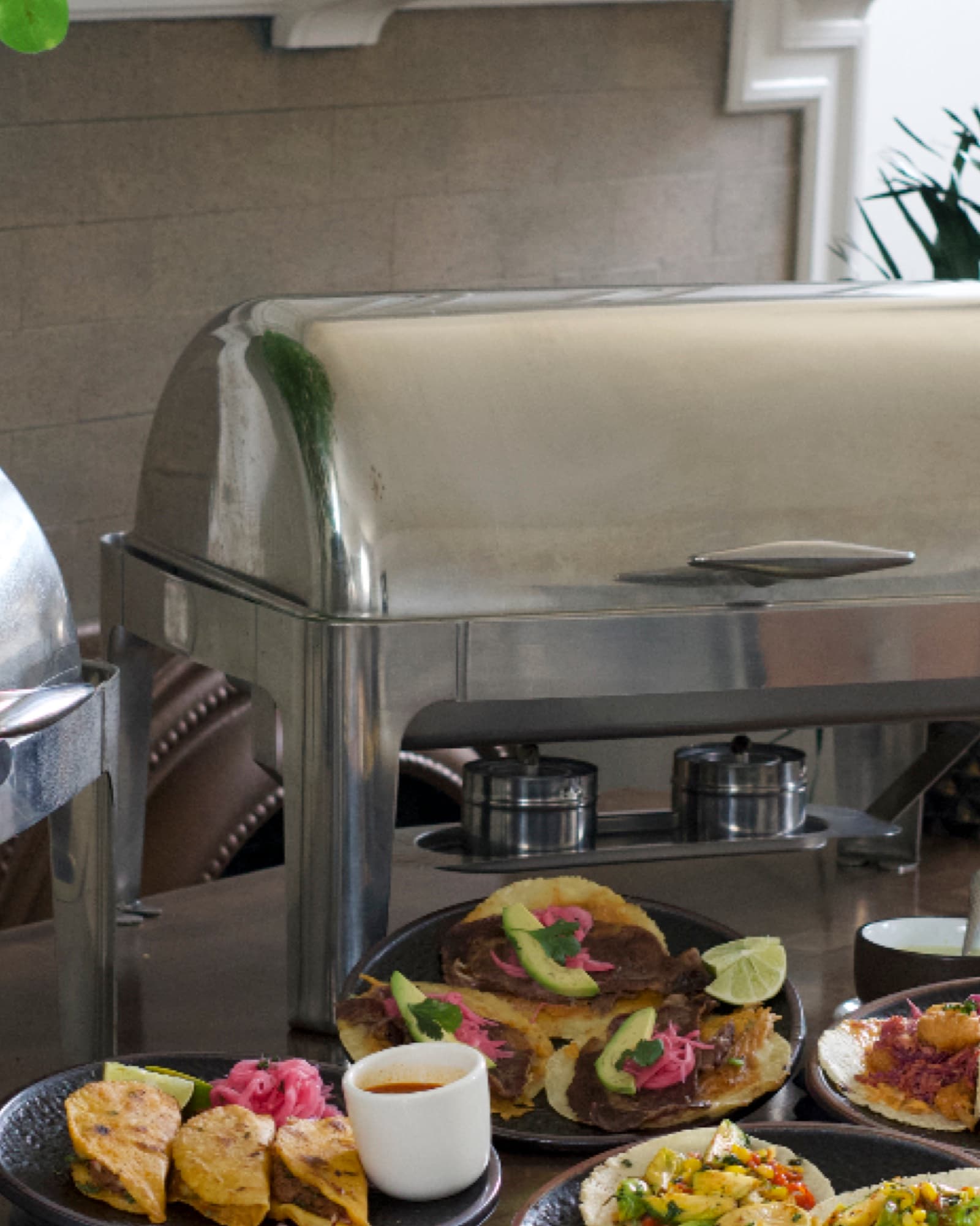 Catering setup on site — chafing dishes and platters