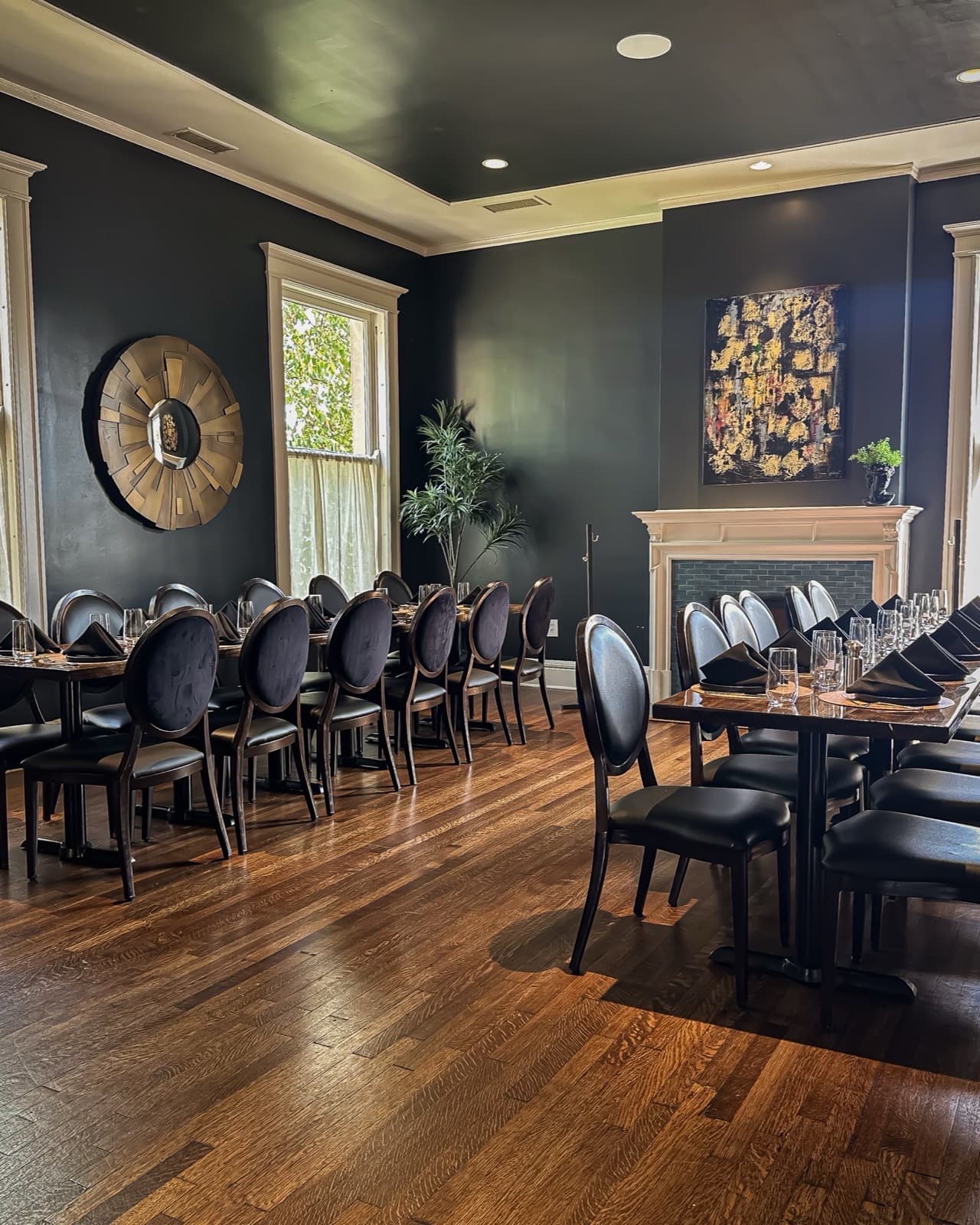 Salon 4 at Union Ave — dark green walls and white fireplace